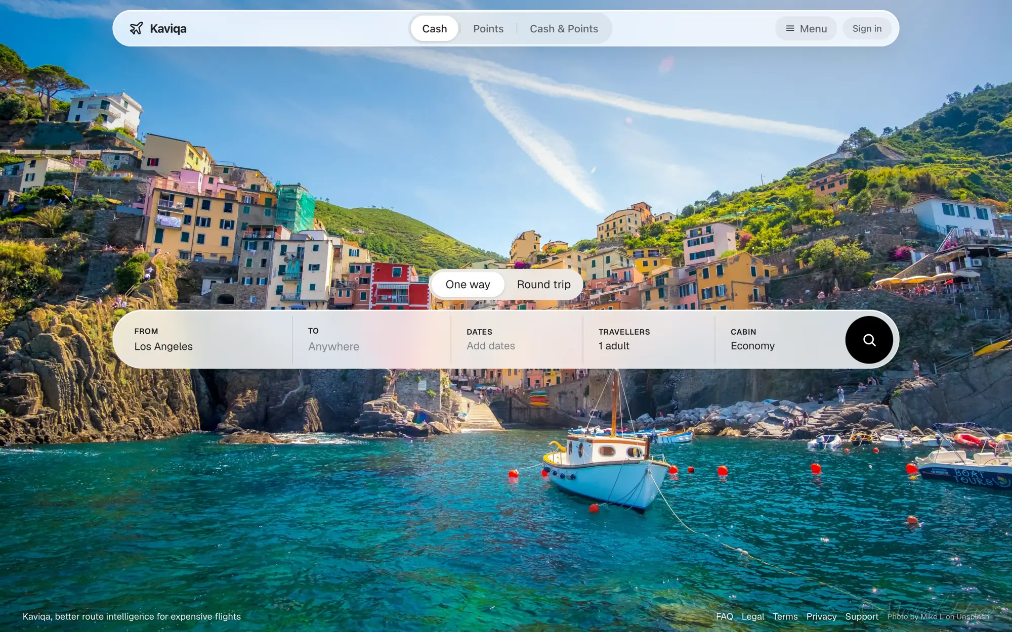 Kaviqa on desktop: a glass flight search bar, departing from Los Angeles, over a full-screen travel photo.